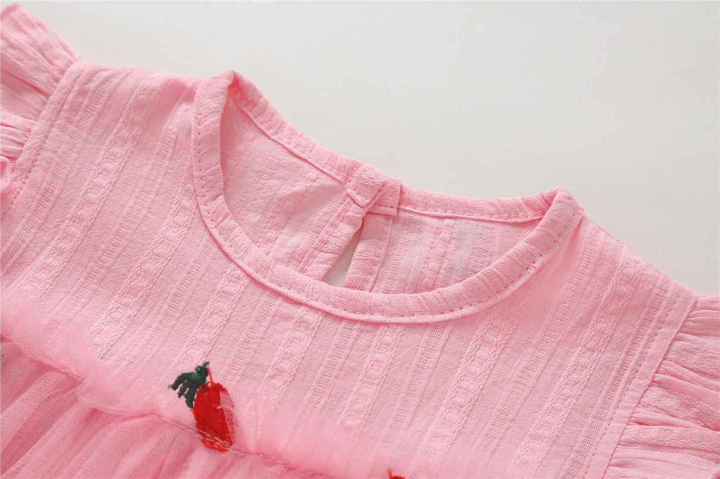 Embroidered Mesh Overlay Flounce Onesie