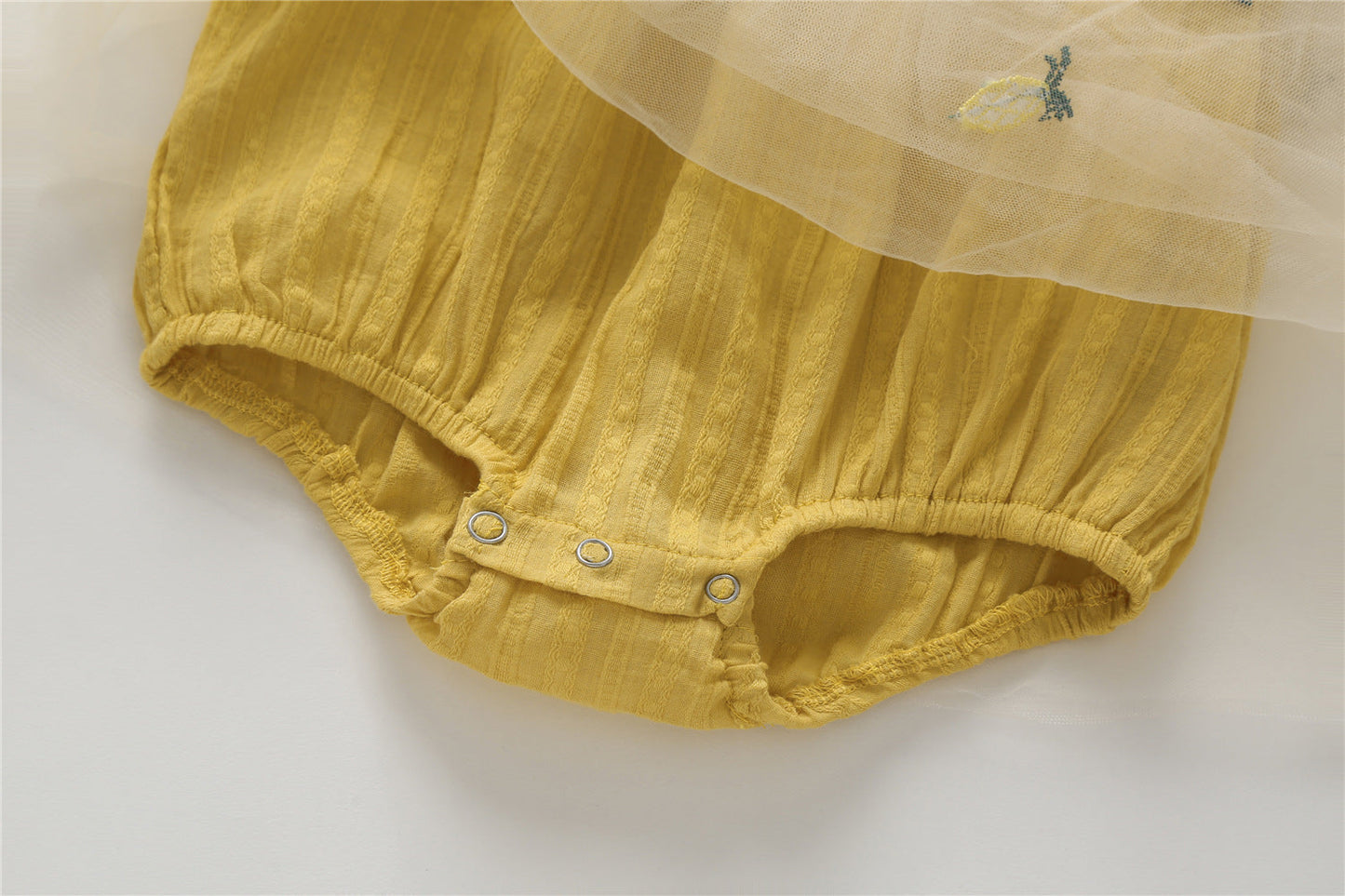Embroidered Mesh Overlay Flounce Onesie