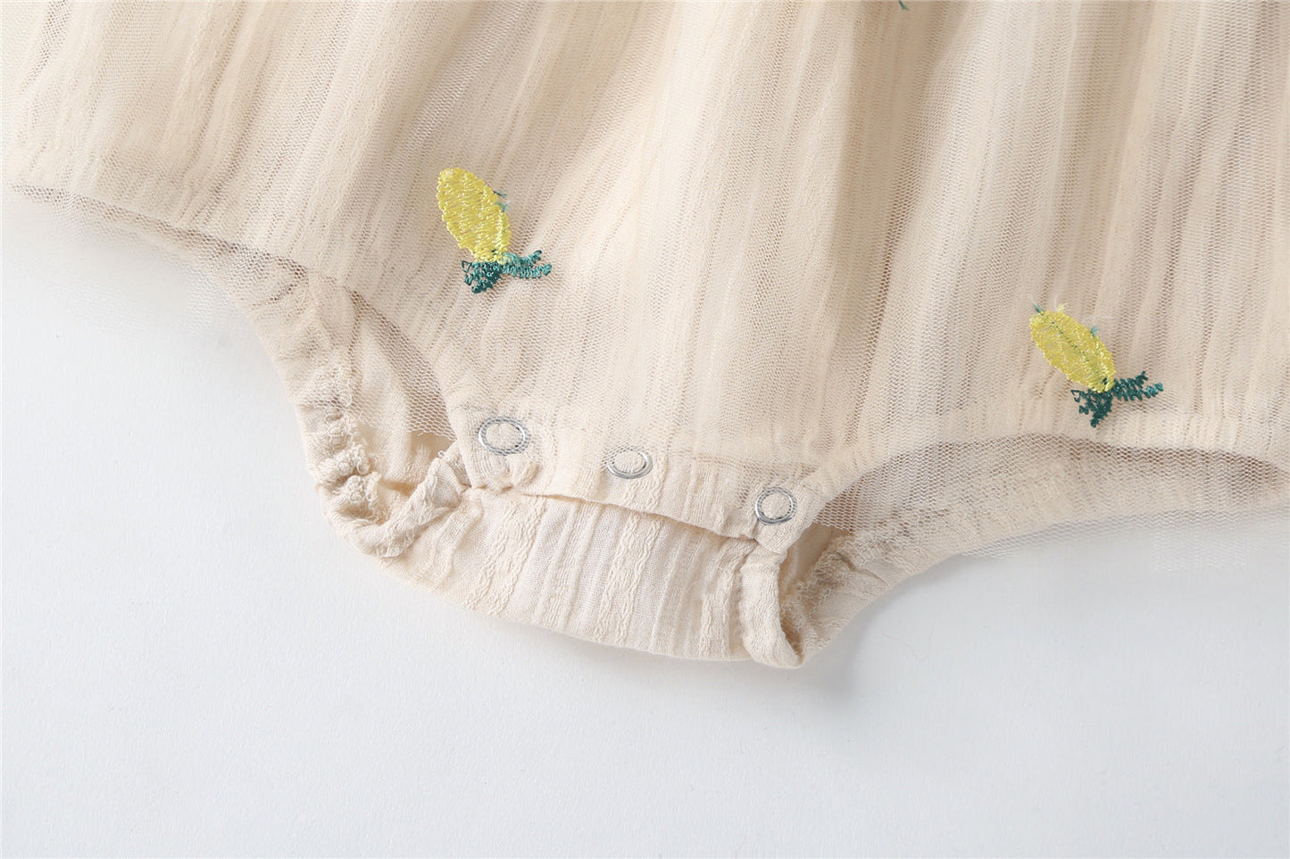 Embroidered Mesh Overlay Flounce Onesie